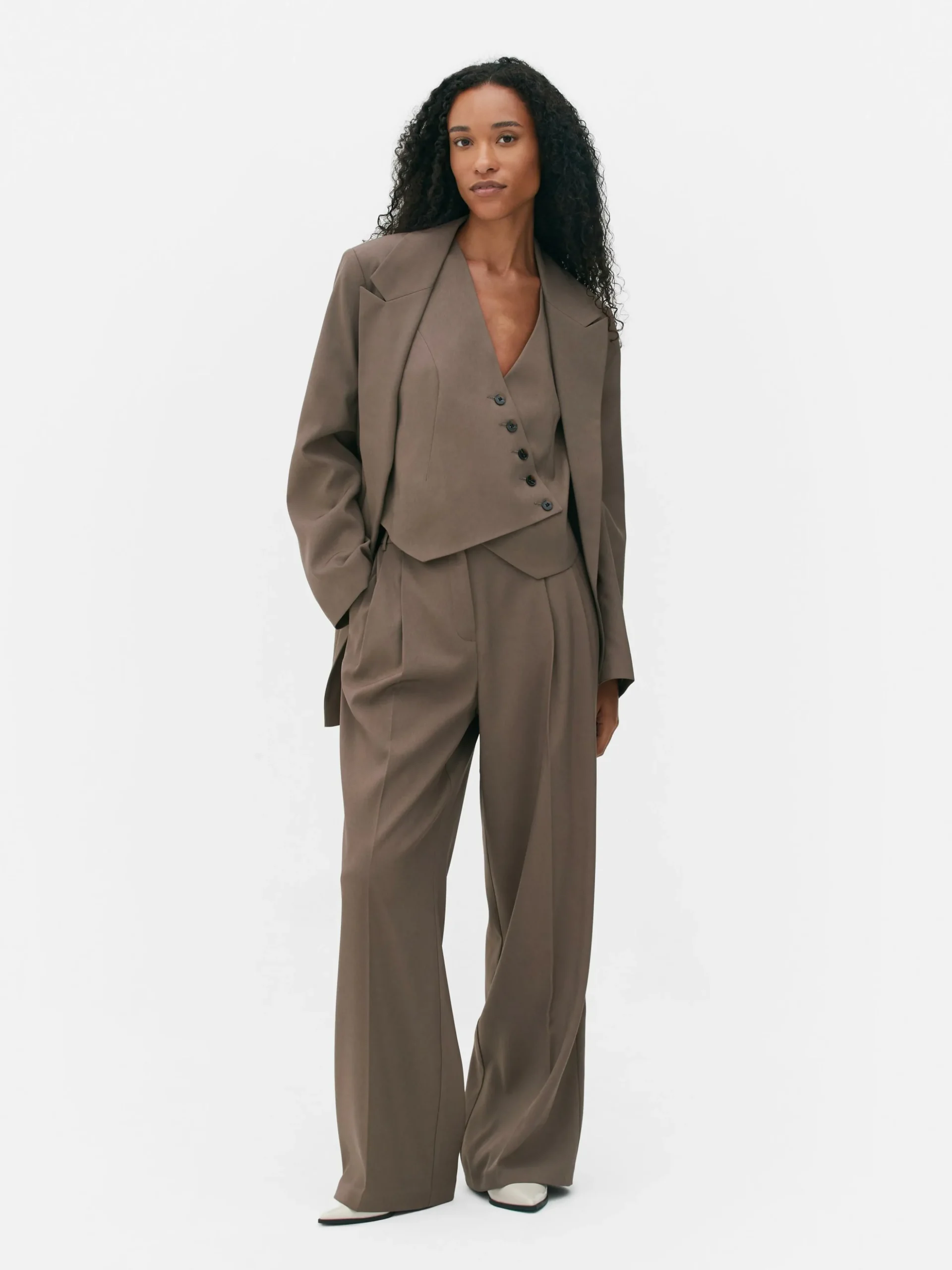 Pantalon Ajusté Plissé Sur Le Devant