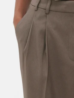 Pantalon Ajusté Plissé Sur Le Devant